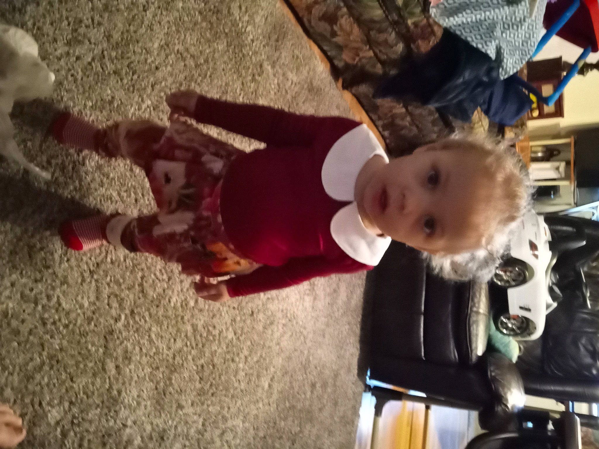 Serenity is registered to the contest to win money with this photo: baby, baby_toddler_clothing, child, flooring, fun, happy, person, sitting, smile, toddler, tree, wood