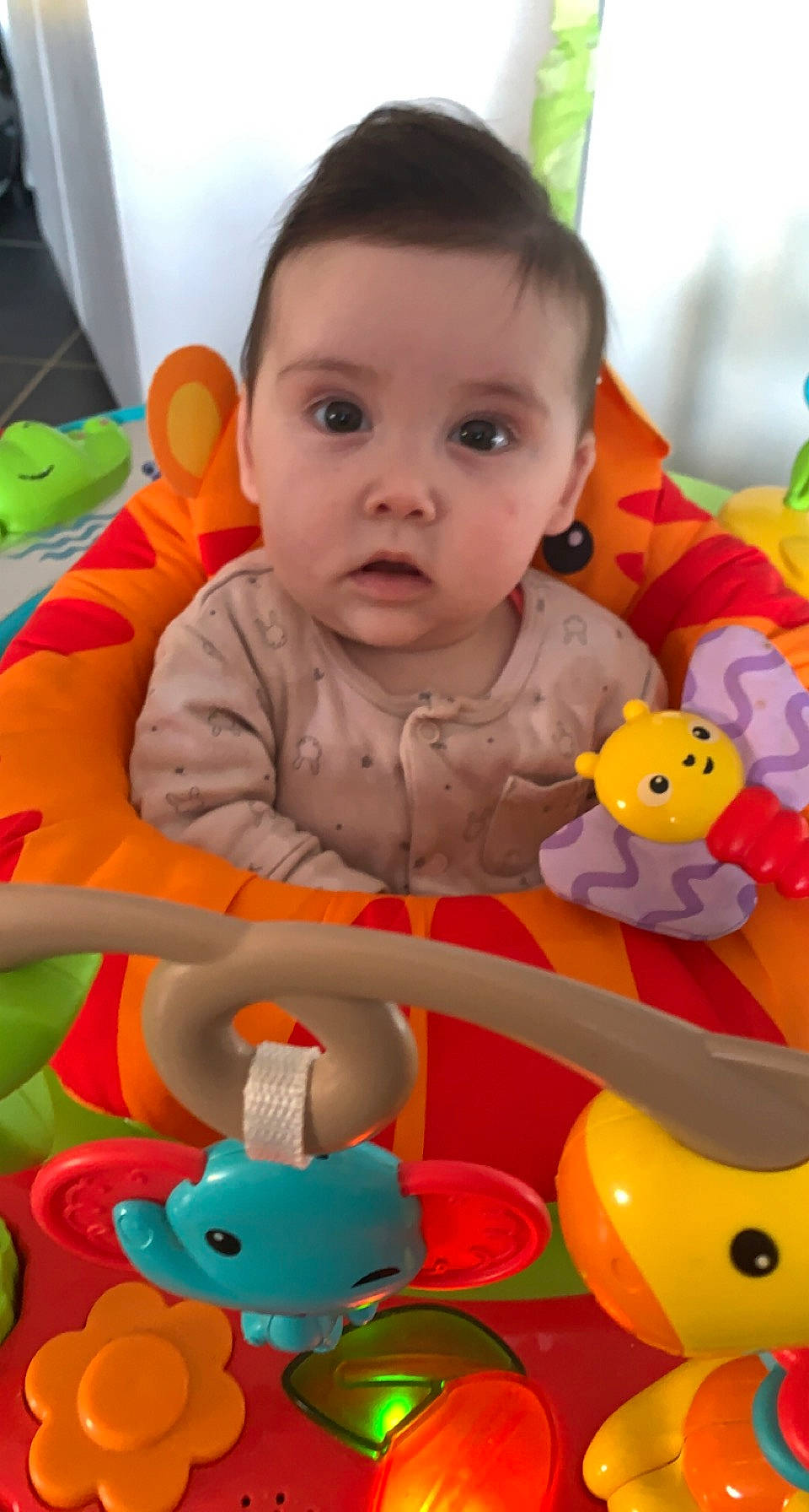 Hélèna participe au concours pour gagner de l'argent avec cette photo : baby, baby_playing_with_toys, baby_toddler_clothing, cheek, eye, face, facial_expression, head, mammal, mouth, nose, orange, organ, person, product, skin, textile, toddler, toy, white