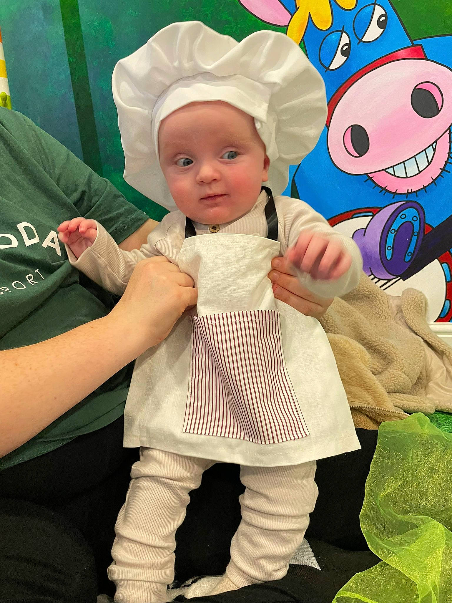 Jack is registered to the contest to win money with this photo: art, baby, baby_products, baby_toddler_clothing, child, event, fashion_accessory, finger, fun, gesture, happy, headwear, organ, people, person, pink, product, sleeve, smile, textile