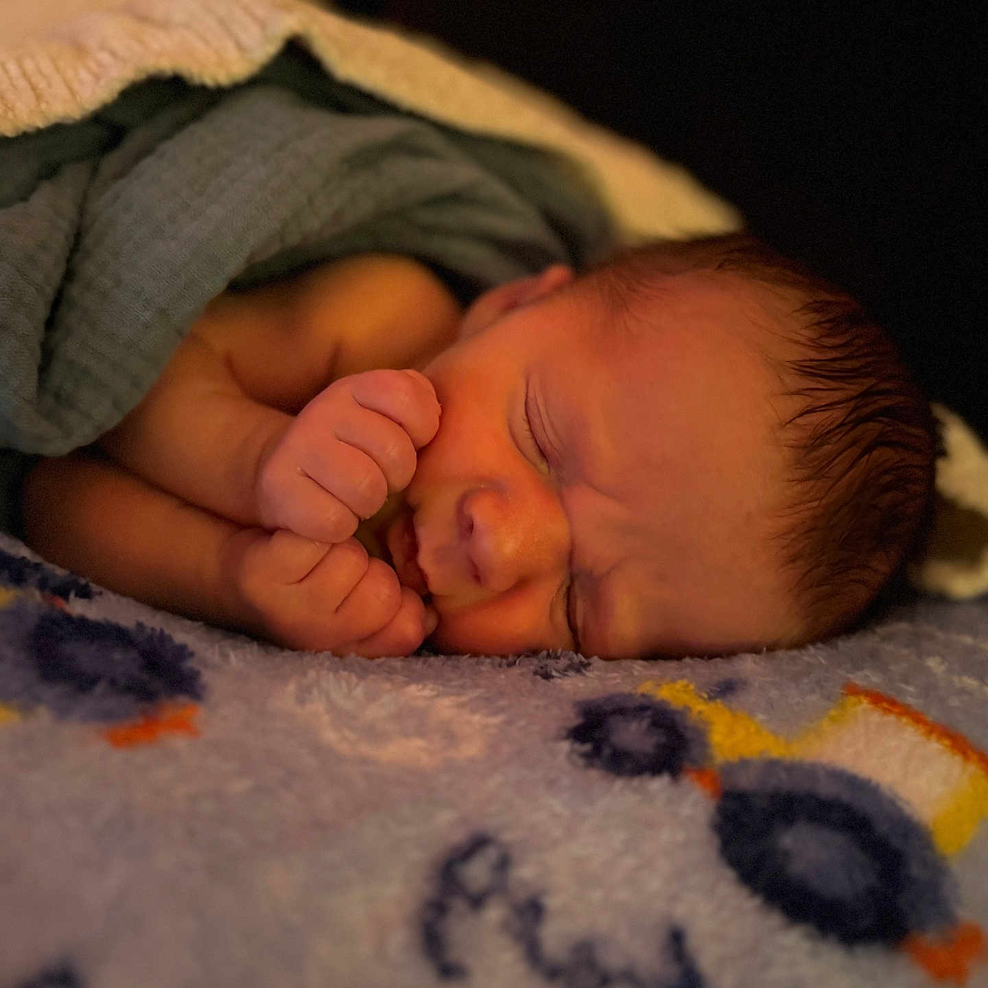 Waylon is registered to the contest to win money with this photo: baby, blanket, bodypart, clothing, face, finger, hand, hat, head, newborn, person, photography, portrait, quilt, sleeping, towel