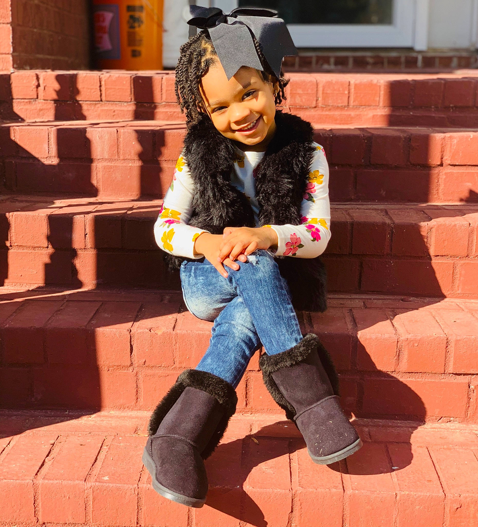Kylah joined the competition — help win amazing prizes! brick, brickwork, denim, footwear, fur, jeans, joy, leg, person, photography, shoe, sitting, style, textile