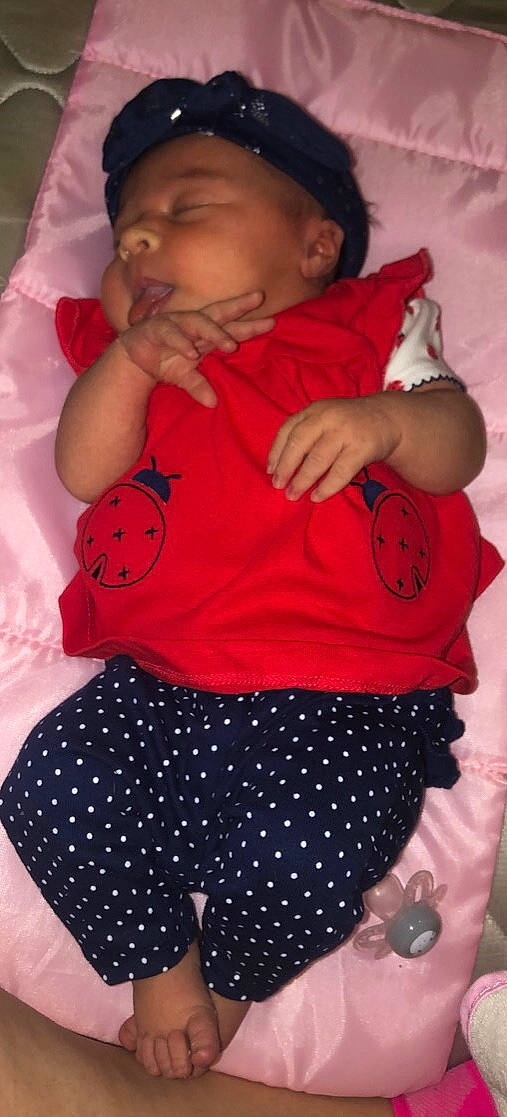 Charlotte joined the competition — help win amazing prizes! abdomen, arm, baby, baby_products, baby_toddler_clothing, cheek, child, design, joint, neck, pattern, person, pink, polka_dot, product, red, sleep, stomach, textile, toddler