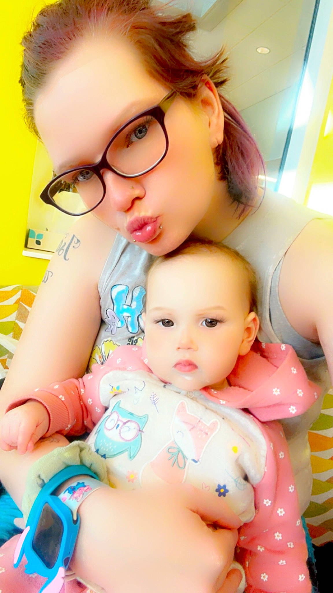 Athena is registered to the contest to win money with this photo: baby, baby_toddler_clothing, beauty, cheek, child, eyewear, facial_expression, fun, gesture, glasses, hairstyle, happy, leisure, person, play, skin, snapshot, thigh, toddler, vision_care
