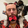 animal, beard, black_and_white_dog, bow_tie, casual, cat_ears, closeup, companion, costume, cute, dog, face, friendship, fun, fur, indoor, man, pet, plaid_shirt, portrait