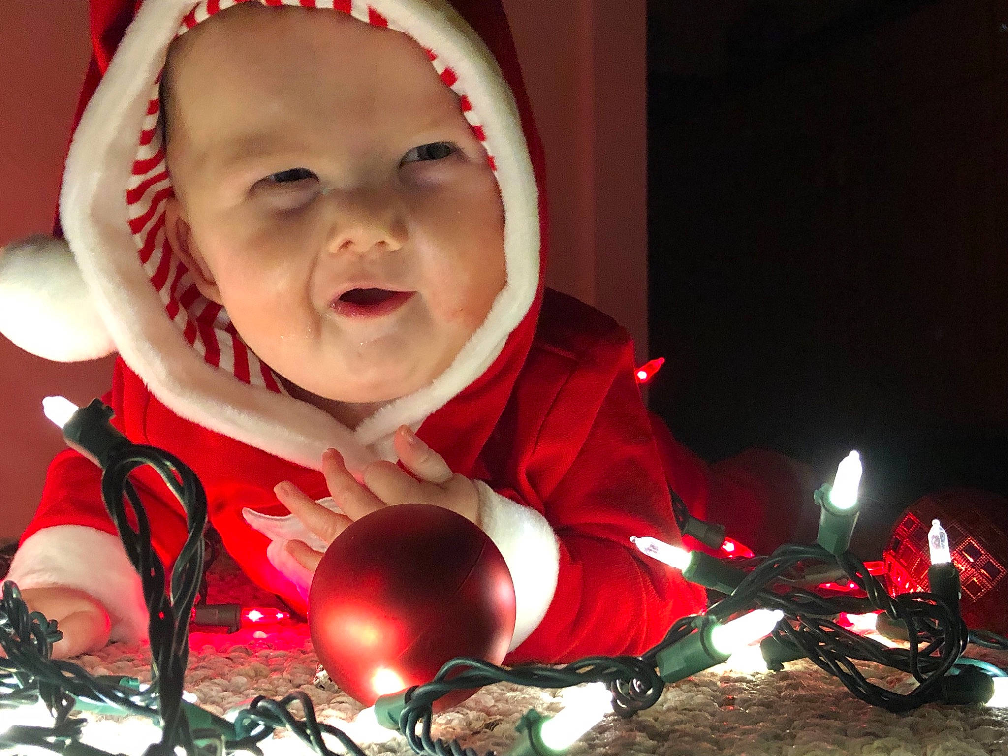 Lincoln joined the competition — help win amazing prizes! child, christmas, christmas_decoration, christmas_ornament, event, fun, holiday, person, red, smile, toddler
