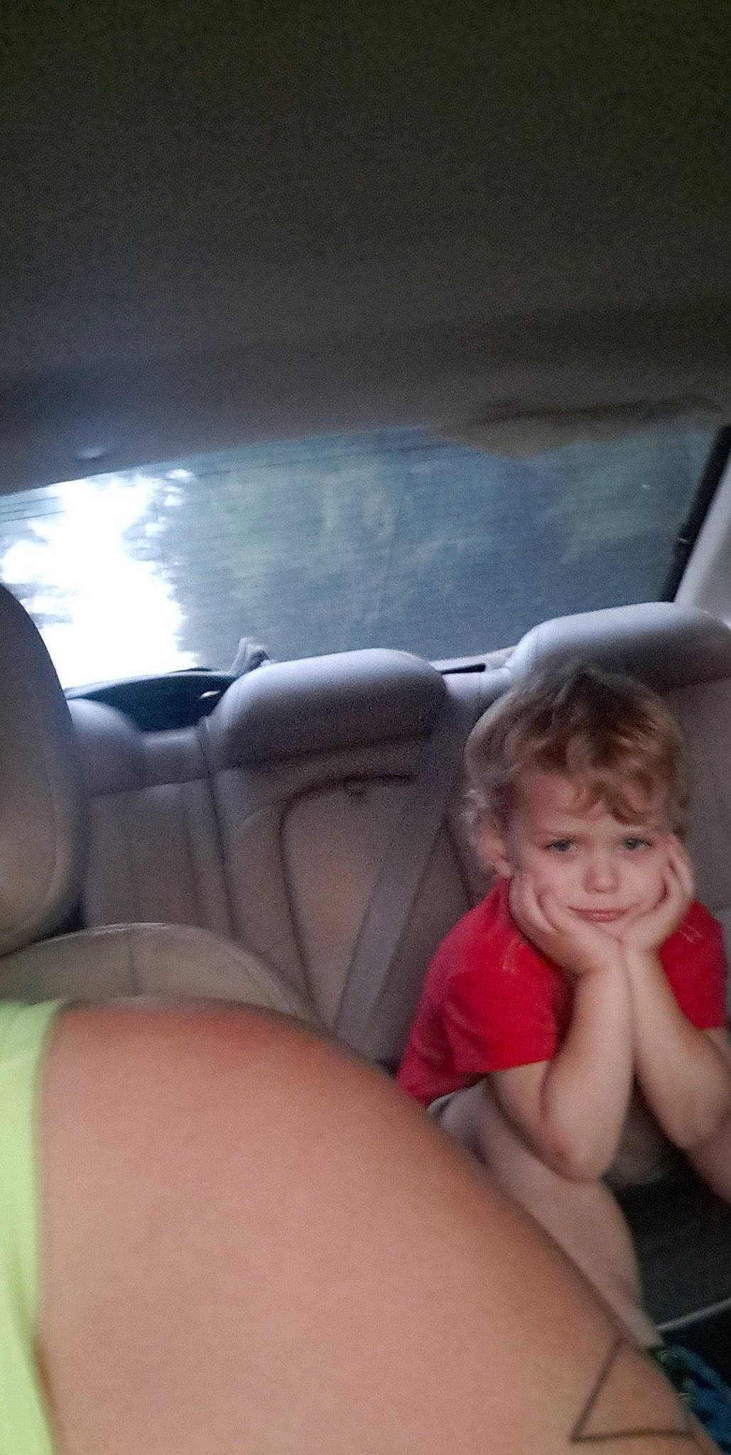 Jaxon is registered to the contest to win money with this photo: auto_part, automotive_design, automotive_exterior, automotive_mirror, car, car_seat, comfort, finger, fun, gesture, head_restraint, human_leg, joy, leg, person, steering_part, steering_wheel, thigh, thumb, vehicle_door