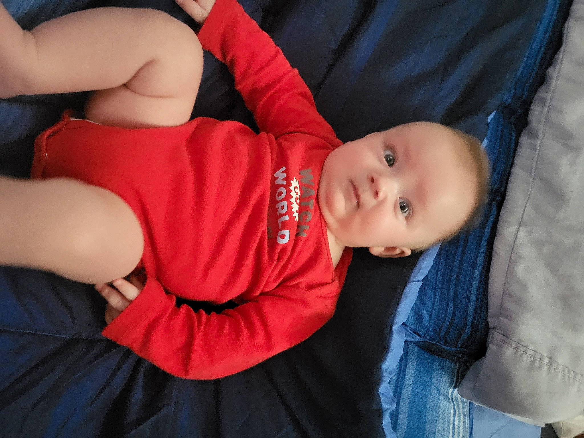 Greyson is registered to the contest to win money with this photo: abdomen, baby, baby_products, baby_toddler_clothing, chest, child, comfort, elbow, flash_photography, fun, gesture, human_leg, knee, mouth, person, sitting, sleeve, thigh, toddler, tree