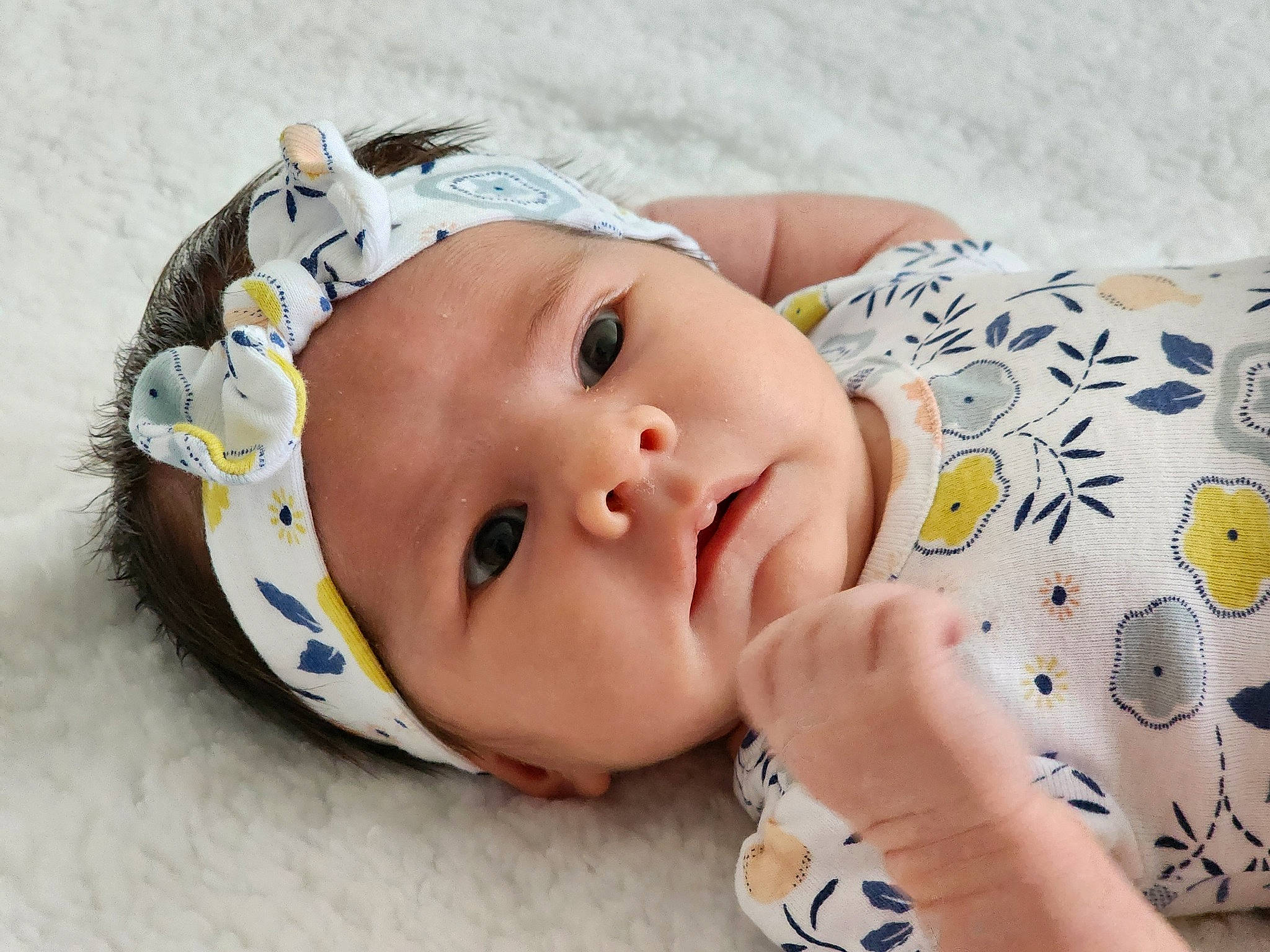 Noemy joined the competition — help win amazing prizes! baby, baby_toddler_clothing, cap, cheek, child, comfort, eye, eyebrow, eyelash, fashion_accessory, hair_accessory, happy, head, headwear, lip, pattern, person, product, skin, sleeve