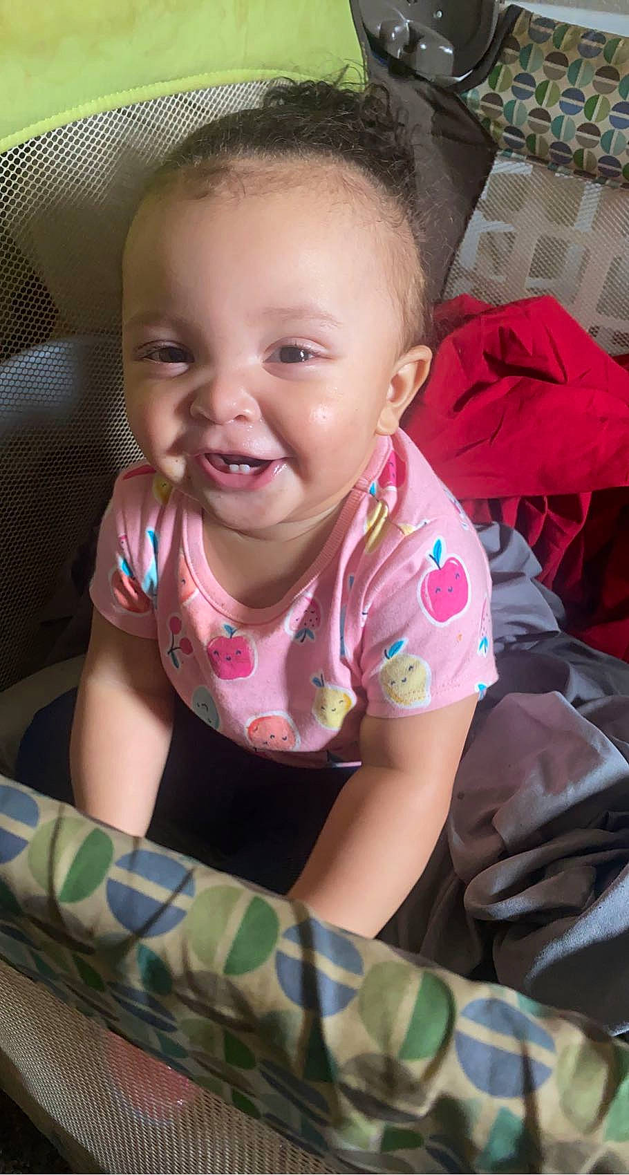 Halo is registered to the contest to win money with this photo: baby, baby_toddler_clothing, cheek, eye, face, facial_expression, hairstyle, head, iris, lip, mouth, neck, nose, person, pink, product, skin, sleeve, smile, textile