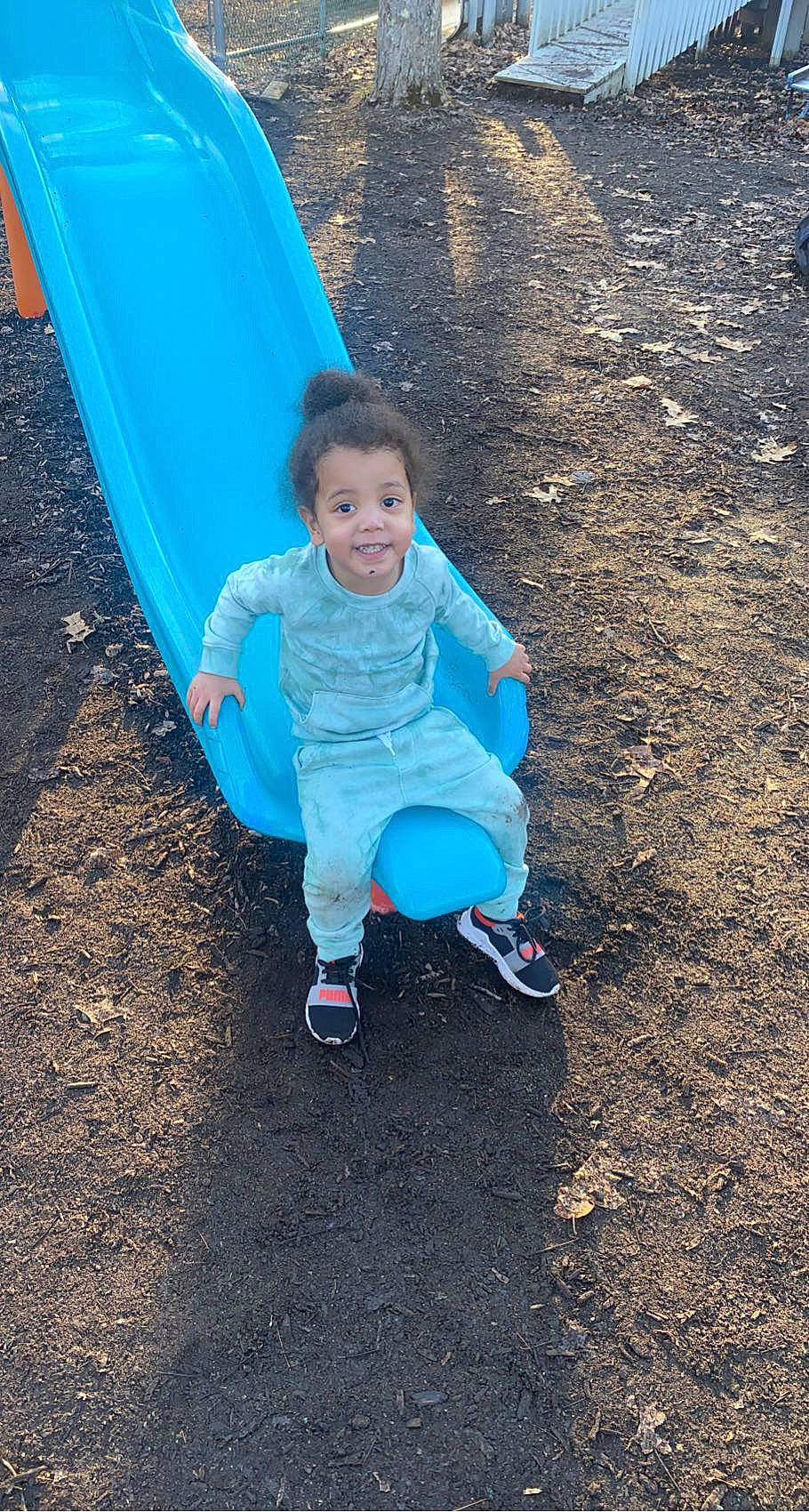 Tru is registered to the contest to win money with this photo: asphalt, baby_toddler_clothing, blue, child, chute, city, electric_blue, eye, fun, grass, joy, leg, leisure, outdoor_play_equipment, people_in_nature, person, product, recreation, road_surface, tints_and_shades