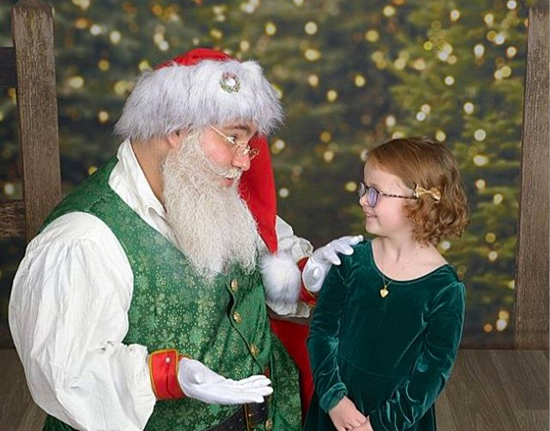 Avianna joined the competition — help win amazing prizes! beard, christmas, christmas_decoration, christmas_eve, event, facial_hair, fictional_character, fun, fur, happy, hat, holiday, interior_design, joy, lap, moustache, outerwear, person, santa_claus, tradition