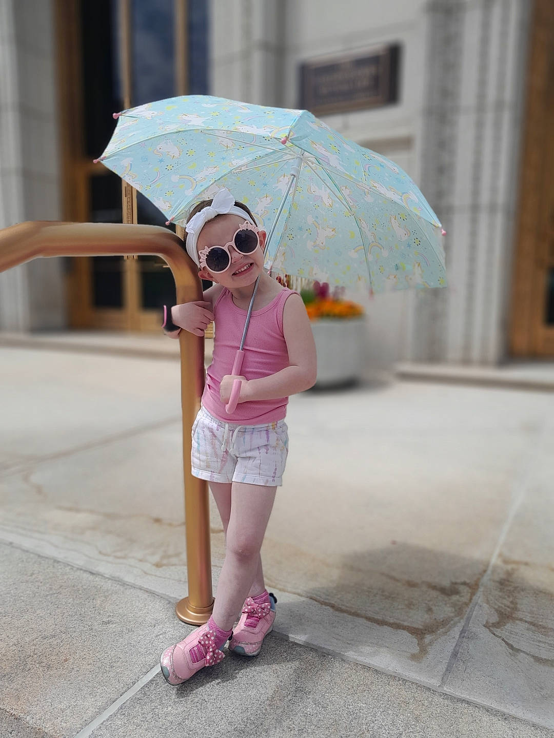 Avianna is registered to the contest to win money with this photo: asphalt, eyewear, fashion_design, glasses, human_leg, joy, knee, leg, leisure, magenta, person, pink, road, road_surface, shorts, sidewalk, smile, sunglasses, thigh, travel