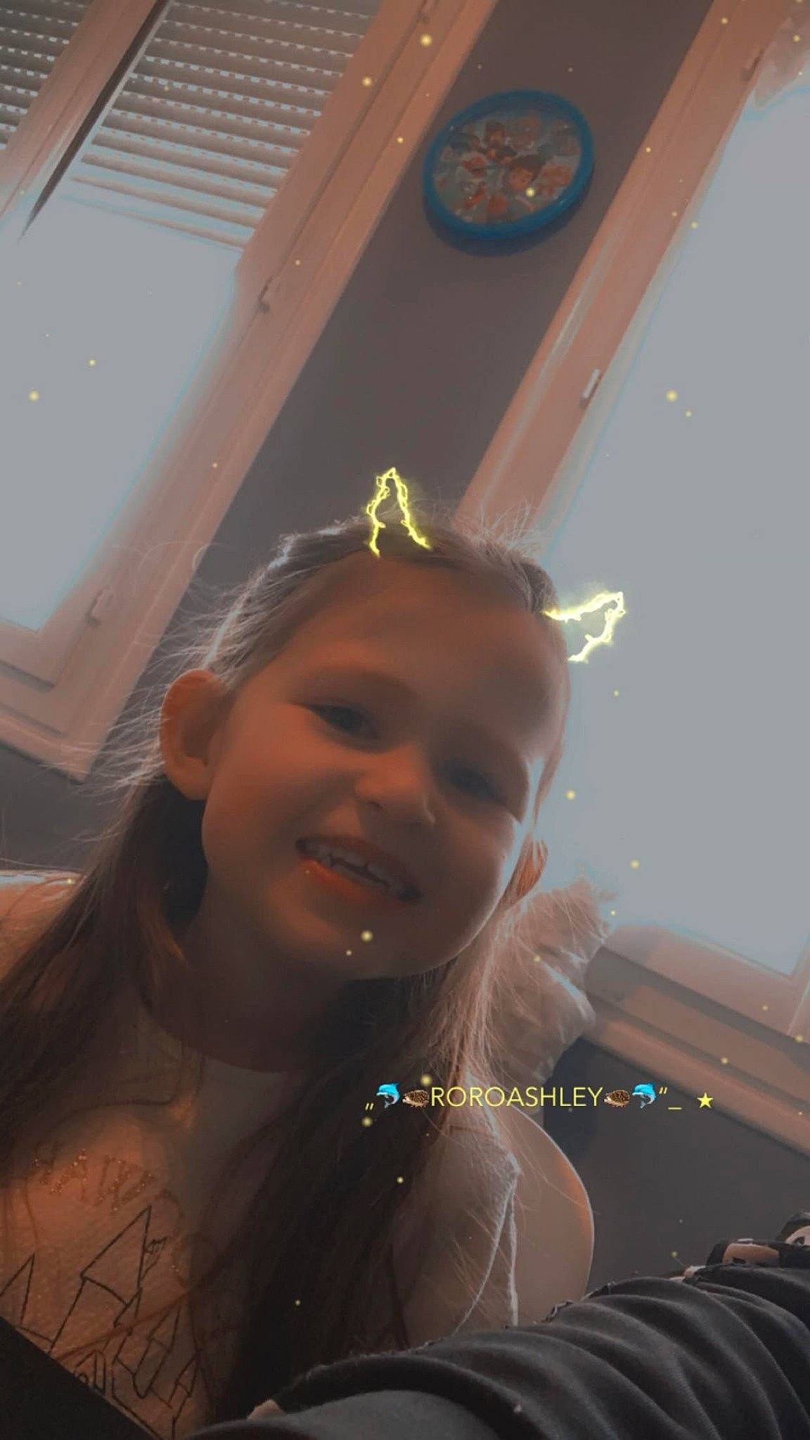 Ashley participe au concours pour gagner de l'argent avec cette photo : black_hair, brown_hair, ceiling, child, eyebrow, eyewear, fun, hair_coloring, happy, jewellery, joy, leisure, light, lighting, lip, neck, person, room, selfie, smile