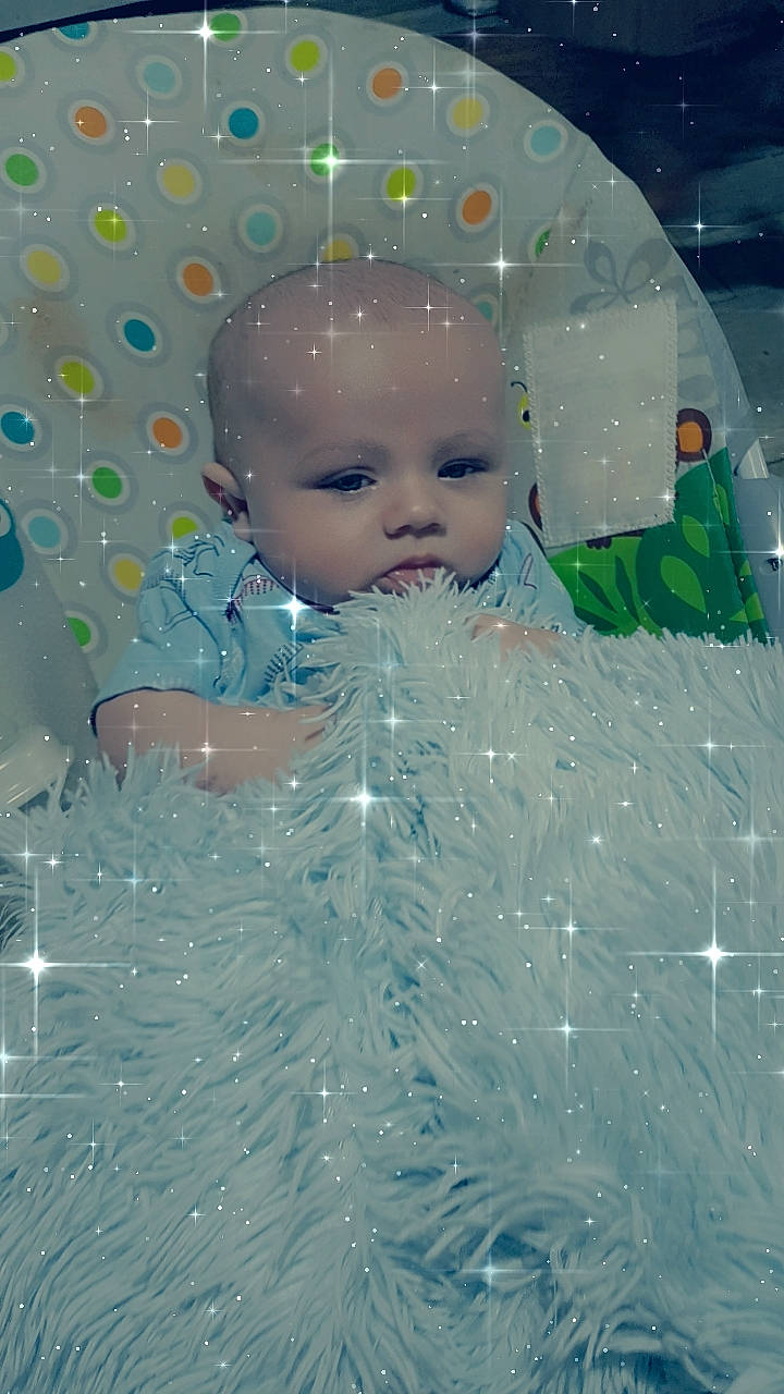 Zaydin is registered to the contest to win money with this photo: baby, cheek, child, circle, event, eye, eyebrow, fashion_accessory, fun, glass, happy, holiday, human_body, iris, pattern, person, plastic, product, space, toddler