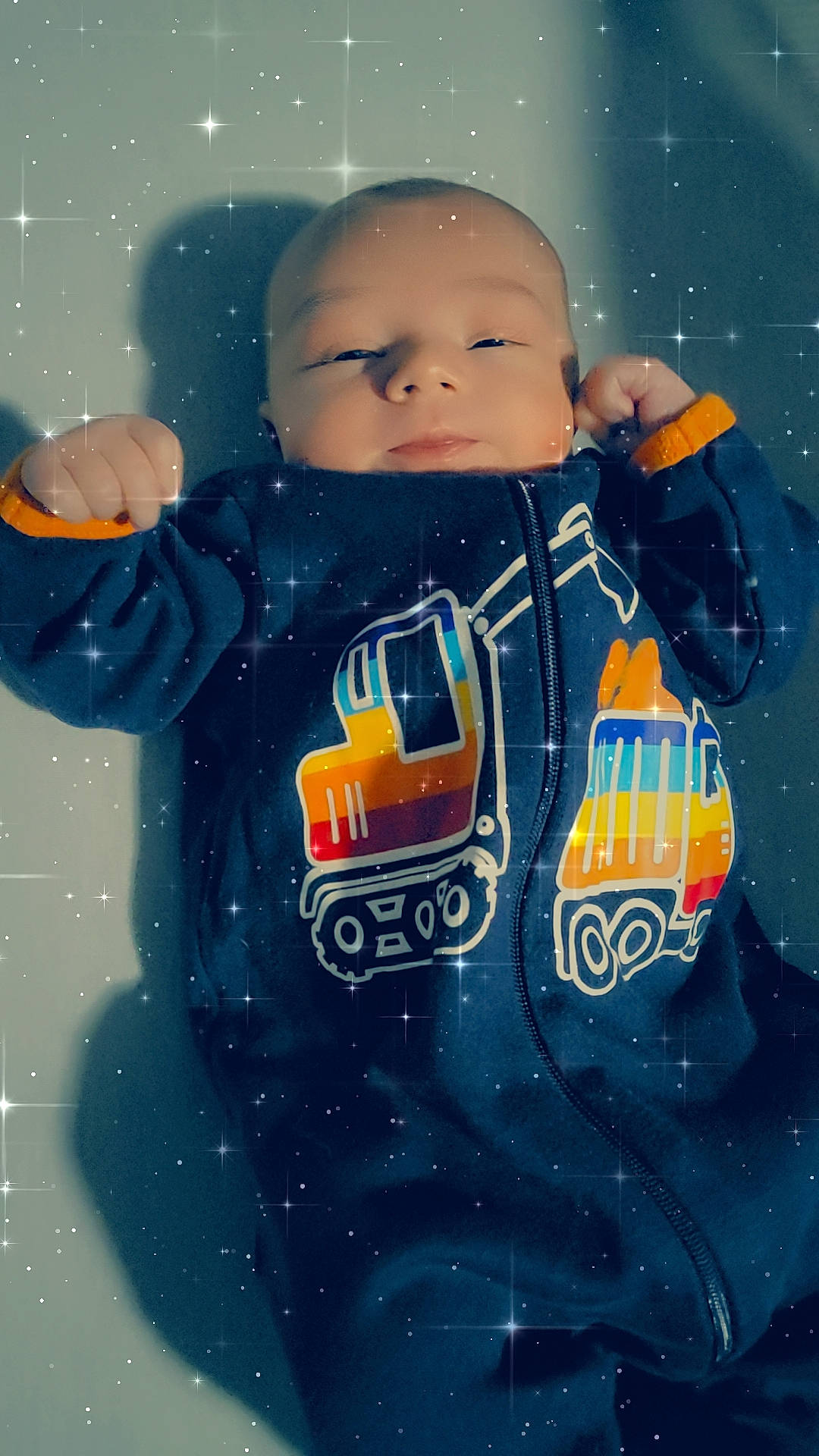 Zaydin is registered to the contest to win money with this photo: astronaut, baby_toys, carmine, child, electric_blue, fictional_character, figurine, font, freezing, gesture, happy, outerwear, person, plastic, sleeve, snow, space, thumb, toddler, toy