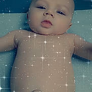 Zaydin is registered to the contest to win money with this photo: accessories, baby, back, bathing, bathtub, bodypart, clothing, diaper, droplet, face, finger, flare, hand, happy, head, inflatable, light, mouth, navel, newborn