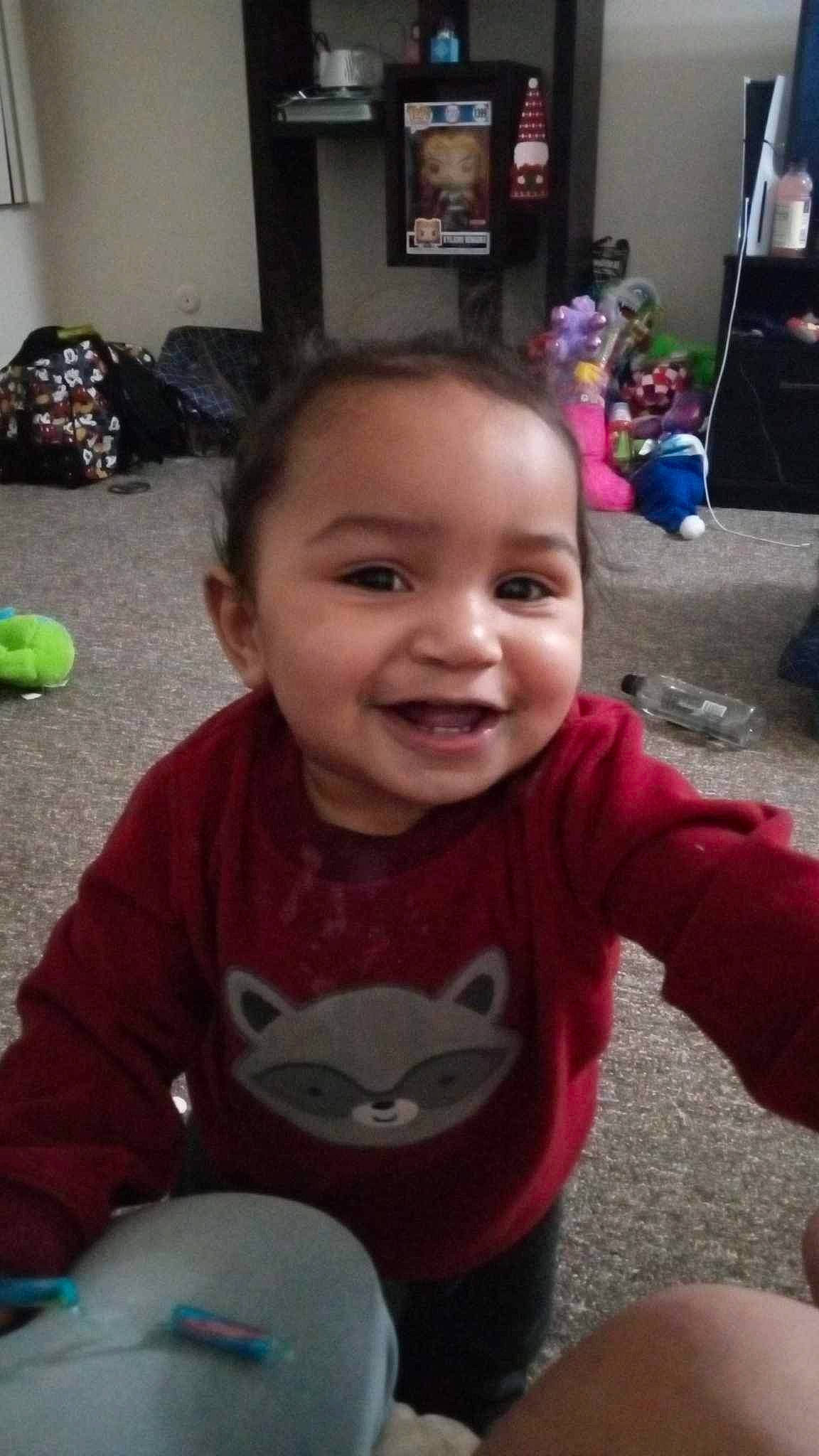 Liam is registered to the contest to win money with this photo: baby, baby_toddler_clothing, cheek, chin, eye, facial_expression, hair, hairstyle, happy, head, iris, joy, mammal, mouth, nose, organ, person, skin, sleeve, smile