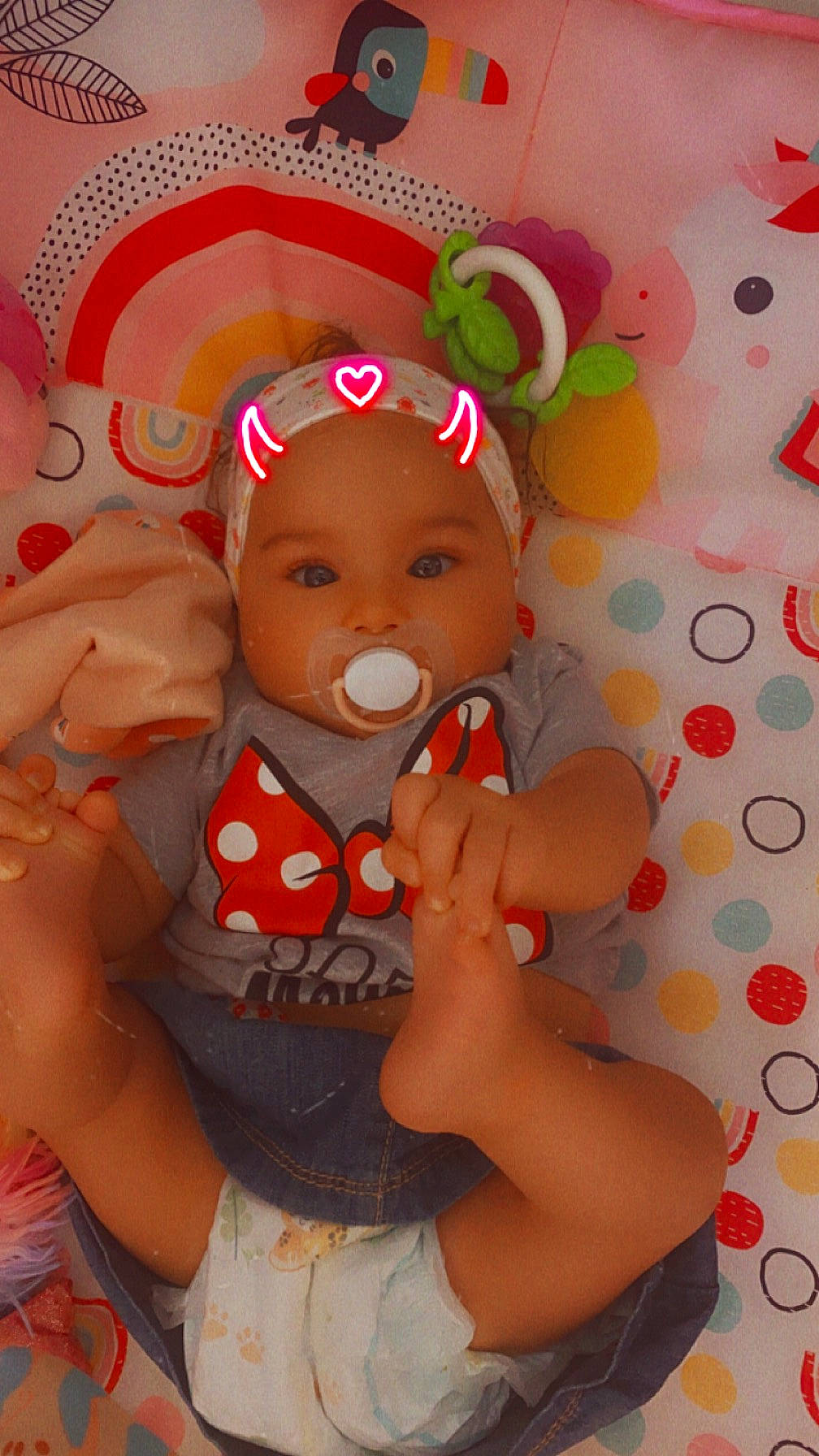 Ericka participe au concours pour gagner de l'argent avec cette photo : abdomen, arm, baby, baby_products, baby_toddler_clothing, cheek, child, face, fun, happy, head, headwear, nail, orange, pattern, person, pink, skin, thigh, toddler