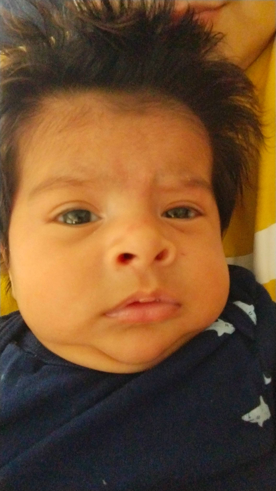 Ezequiel is registered to the contest to win money with this photo: baby, black_hair, cheek, child, chin, ear, eyebrow, eyelash, forehead, hairstyle, happy, iris, jaw, lip, mouth, no_expression, nose, person, skin, toddler