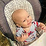 Anakyn joined the competition — help win amazing prizes! baby, child, high_chair, smiling, happy, food, messy, clothing, onesie, spiderman, indoor, floor, wooden_floor, infant, seat, feeding, cute, portrait, person, young