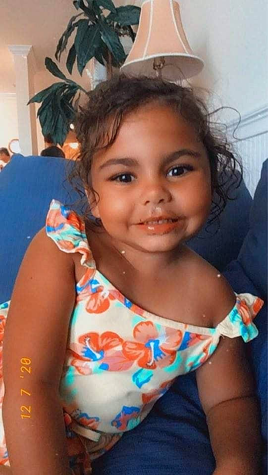 Harleigh is registered to the contest to win money with this photo: baby_toddler_clothing, bracelet, child, home_accessories, houseplant, joy, lamp, lampshade, light_fixture, lighting, lighting_accessory, neck, person, skin, throat, toddler