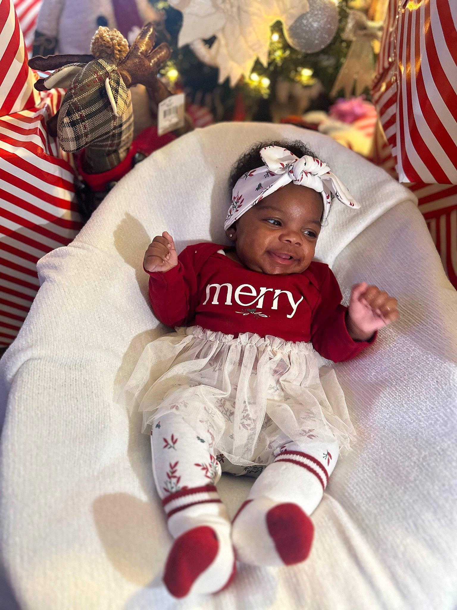 Zivia joined the competition — help win amazing prizes! baby, baby_toddler_clothing, bag, carmine, chair, child, christmas_eve, comfort, costume_hat, event, fictional_character, flag, fun, happy, headwear, holiday, lap, person, sitting, sleeve