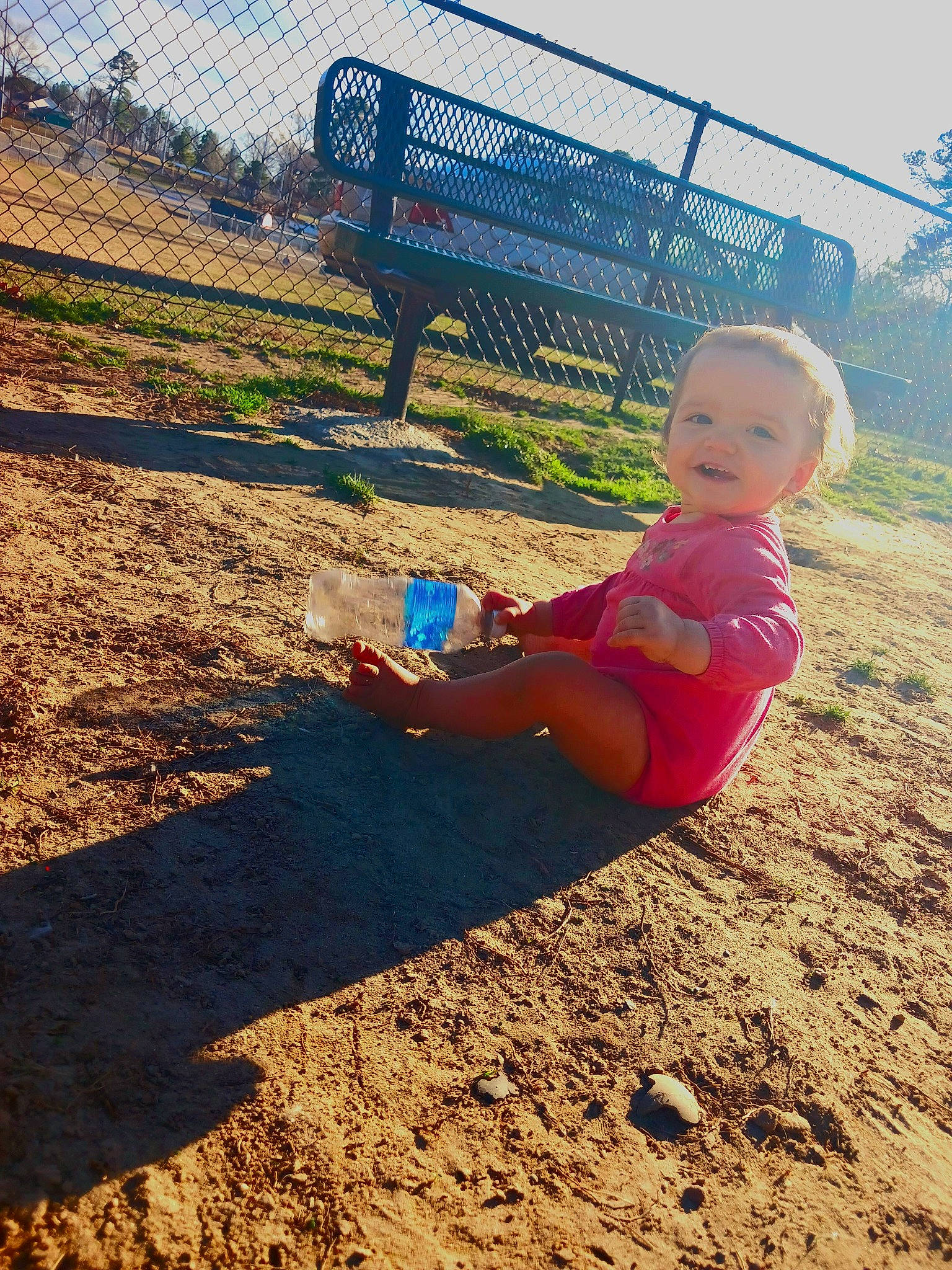 Serenity joined the competition — help win amazing prizes! baby_toddler_clothing, city, fence, fun, grass, happy, horizon, landscape, leisure, outdoor_play_equipment, people_in_nature, person, plant, recreation, sand, sky, soil, swing, toddler, tree