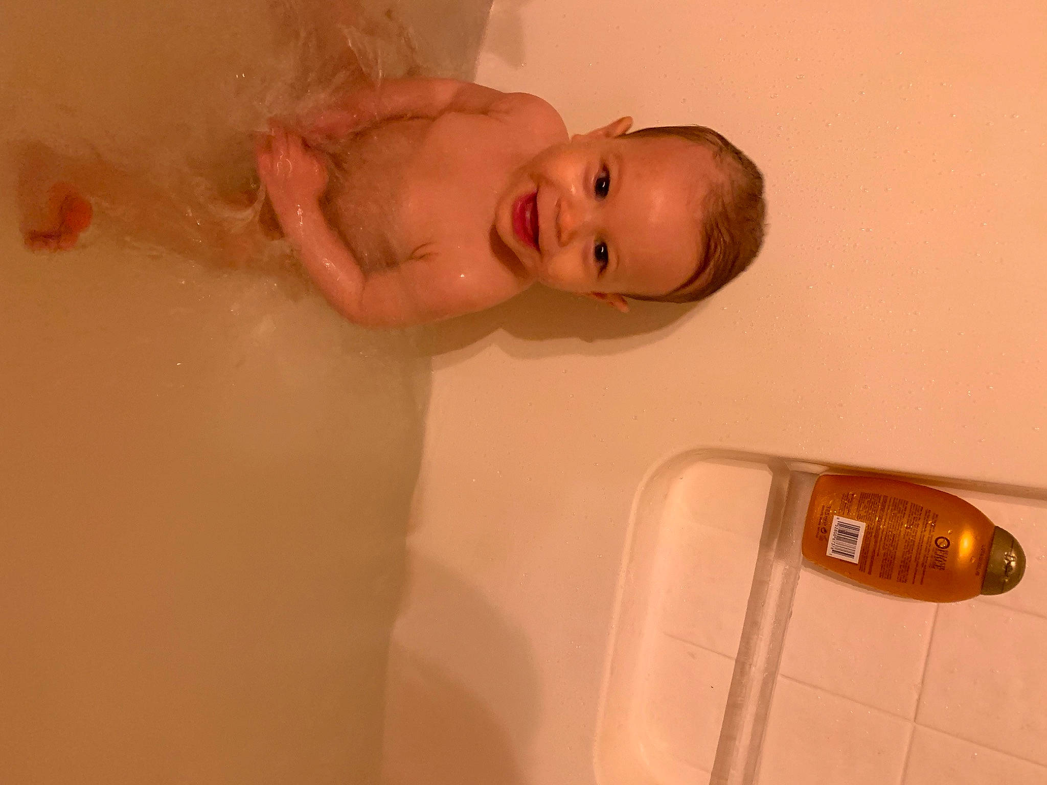 Nyla May joined the competition — help win amazing prizes! baby, bathing, bathroom, bathtub, chest, eye, finger, hair, hand, head, human_body, joy, lip, nose, person, personal_care, plumbing_fixture, skin, smile, stomach