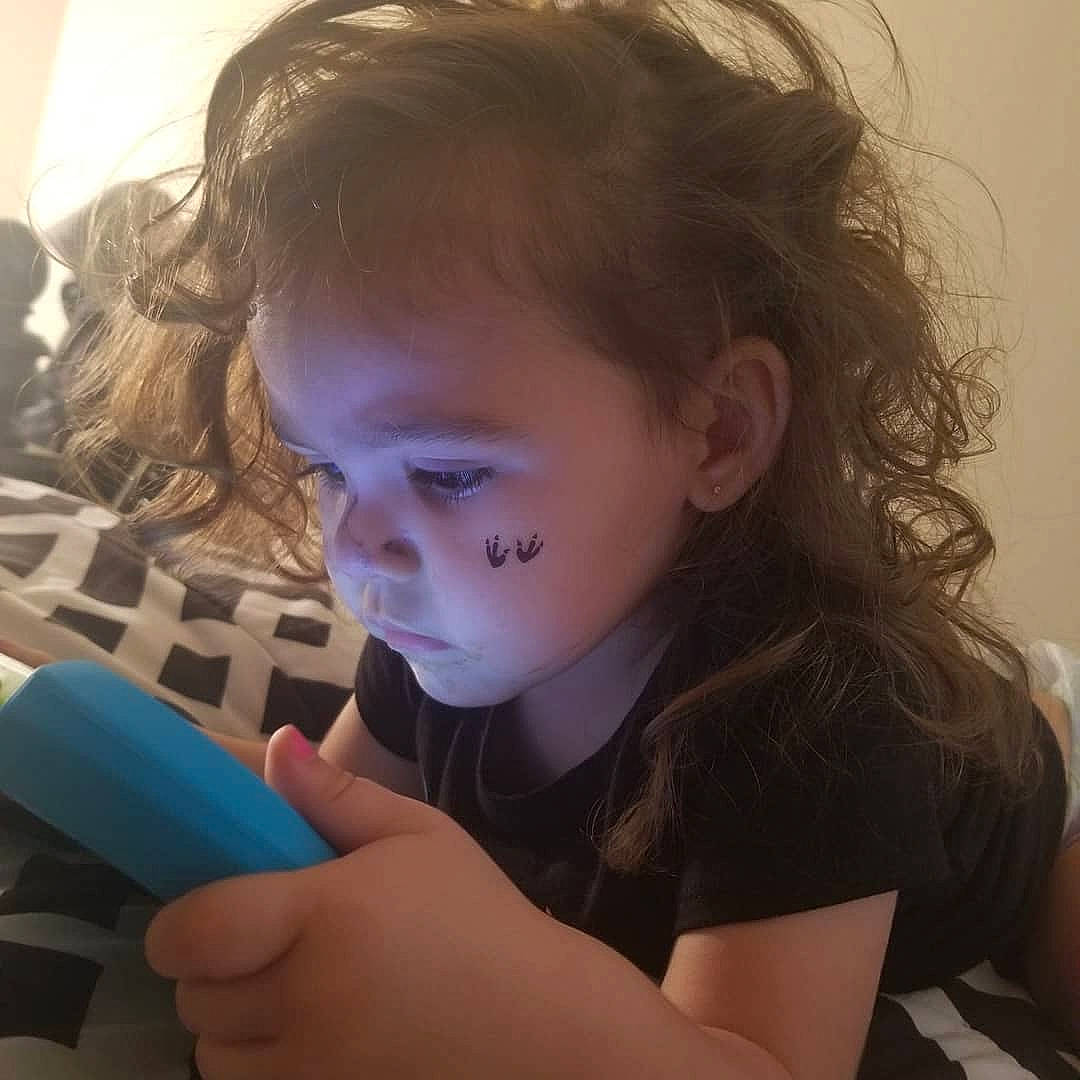 Raine is registered to the contest to win money with this photo: arm, beauty, cheek, child, ear, eye, eyebrow, face, forehead, hair, hairstyle, head, joint, lip, mouth, nose, person, shoulder, skin, technology