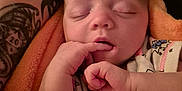 Lydia Bree is registered to the contest to win money with this photo: baby, sleeping, blanket, tattoo, arm, infant, closeup, cozy, peaceful, hand, fingers, soft_lighting, portrait, newborn, resting, skin, cute, warm, comfort, child