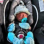 Maverick is registered to the contest to win money with this photo: baby, blue_clothing, car_seat, child, closeup, cozy, cute, hat, indoors, infant, mittens, newborn, pacifier, portrait, resting, seatbelt, secured, sleeping, socks, soft