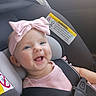 baby, child, infant, smiling, happy, portrait, car_seat, vehicle, seatbelt, safety_harness, pink_bow, pink_clothing, headband, blue_eyes, face, indoors, passenger, close_up, photography,  안전