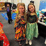 Delayni joined the competition — help win amazing prizes! child, children, costume, dress, classroom, lollipop, smile, girl, playful, fun, celebration, holiday, indoor, carpet, table, chair, poster, drawing, friendship, halloween