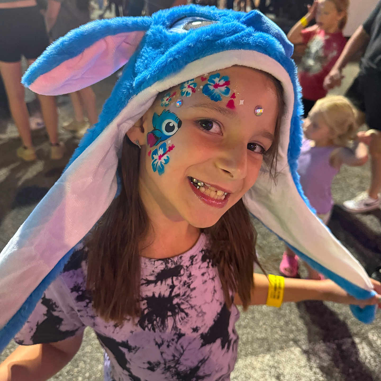 Delayni joined the competition — help win amazing prizes! blue_hat, celebration, child, costume, crowd, evening, event, face_paint, festival, fun, girl, happy, long_hair, outdoor, people, portrait, purple_tshirt, smiling, tshirt, wristband
