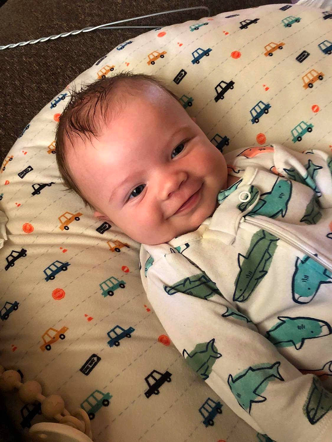 Kashton joined the competition — help win amazing prizes! baby, baby_toddler_clothing, cheek, child, chin, comfort, eye, facial_expression, happy, head, joy, linens, pattern, people, person, product, room, skin, sleeve, smile
