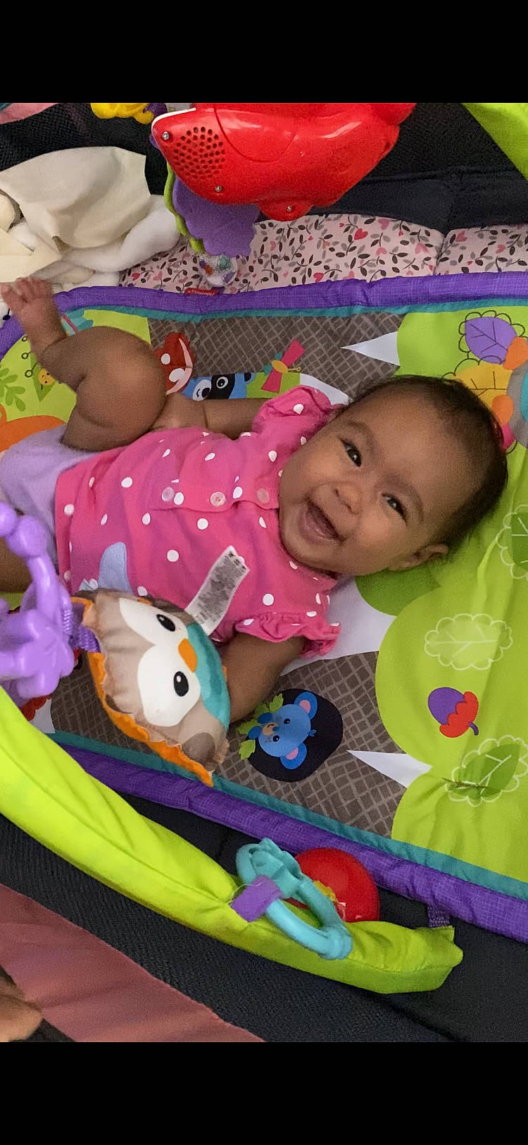 Francesca is registered to the contest to win money with this photo: baby, baby_toddler_clothing, cheek, child, event, fun, happy, leisure, linens, pattern, person, pink, play, product, skin, smile, stuffed_toy, textile, toddler, toy