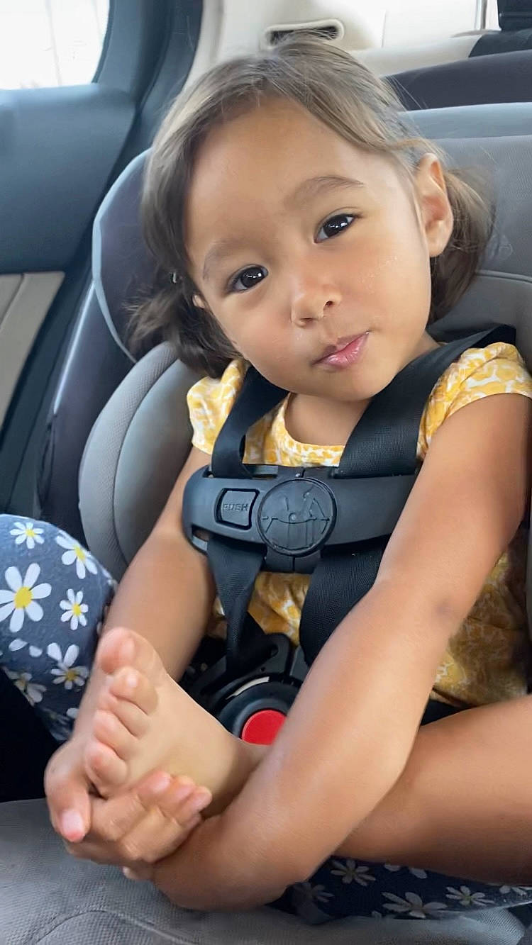 Francesca is registered to the contest to win money with this photo: auto_part, automotive_design, automotive_exterior, baby_in_car_seat, car, car_seat, car_seat_cover, child, comfort, hand, happy, head_restraint, motor_vehicle, person, plant, seat_belt, steering_part, steering_wheel, thumb, toddler