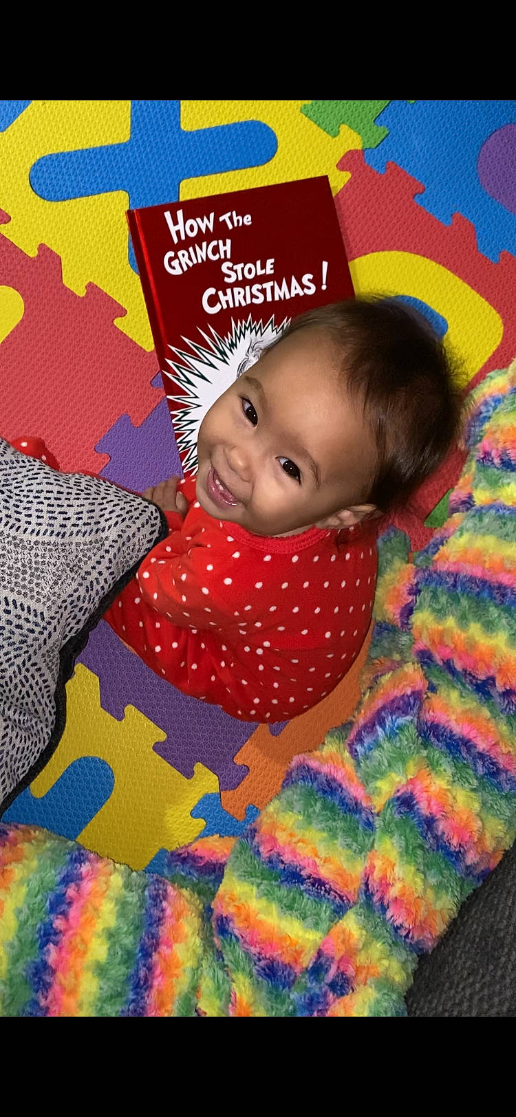 Francesca is registered to the contest to win money with this photo: art, baby, baby_products, baby_toddler_clothing, cheek, child, comfort, design, happy, linens, magenta, nose, pattern, person, play, red, room, skin, smile, textile