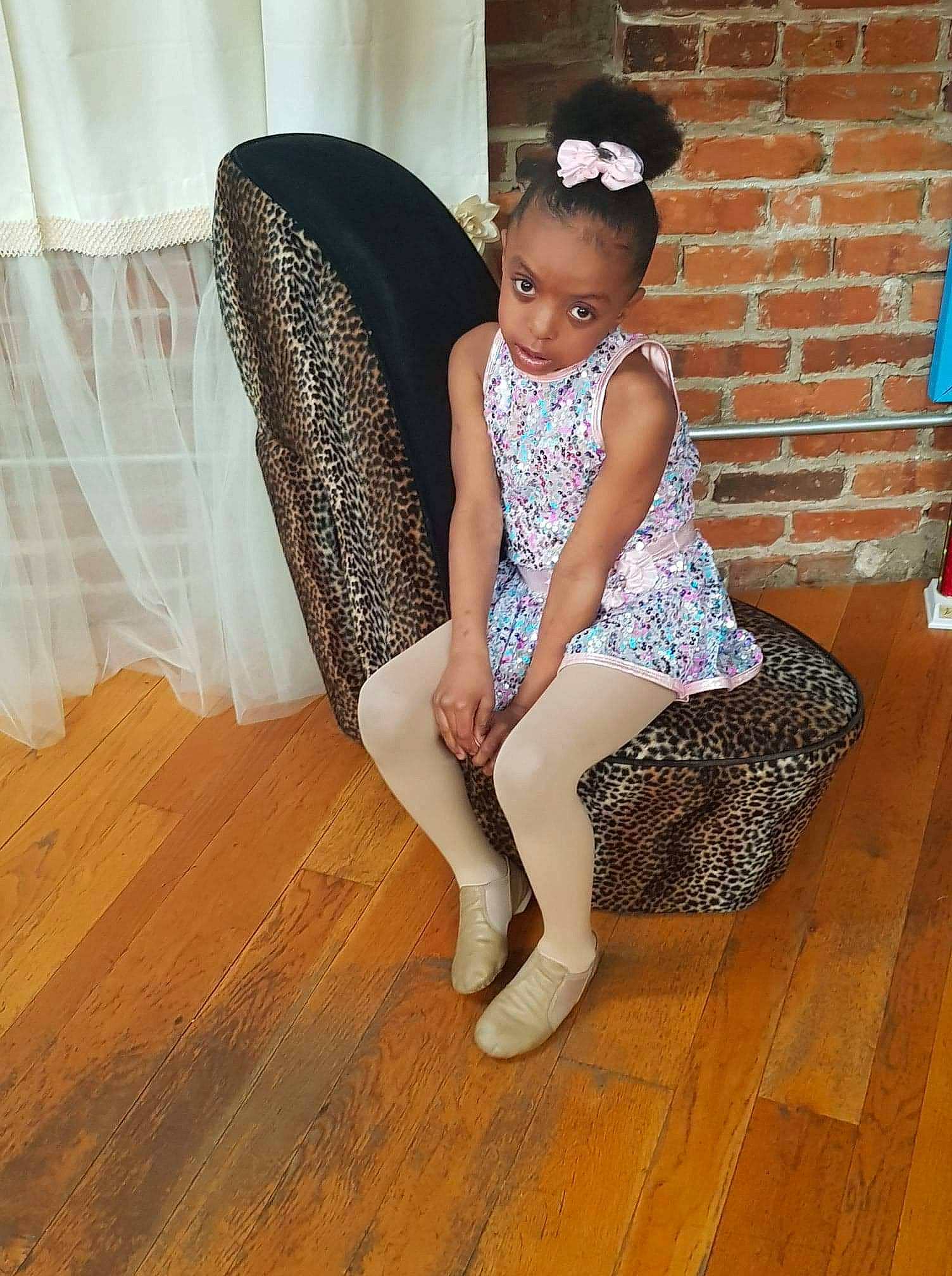 Madisen joined the competition — help win amazing prizes! floor, flooring, footwear, hardwood, human_leg, knee, leg, person, shoe, sitting, thigh, tights, wood_flooring