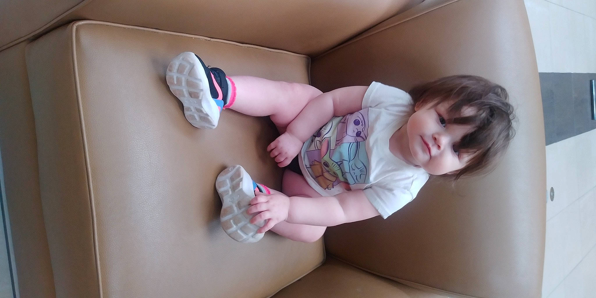 Zelda joined the competition — help win amazing prizes! child, comfort, elbow, finger, flooring, foot, human_leg, knee, leg, nail, person, pink, room, shoe, sitting, skin, sneakers, sock, thigh, thumb