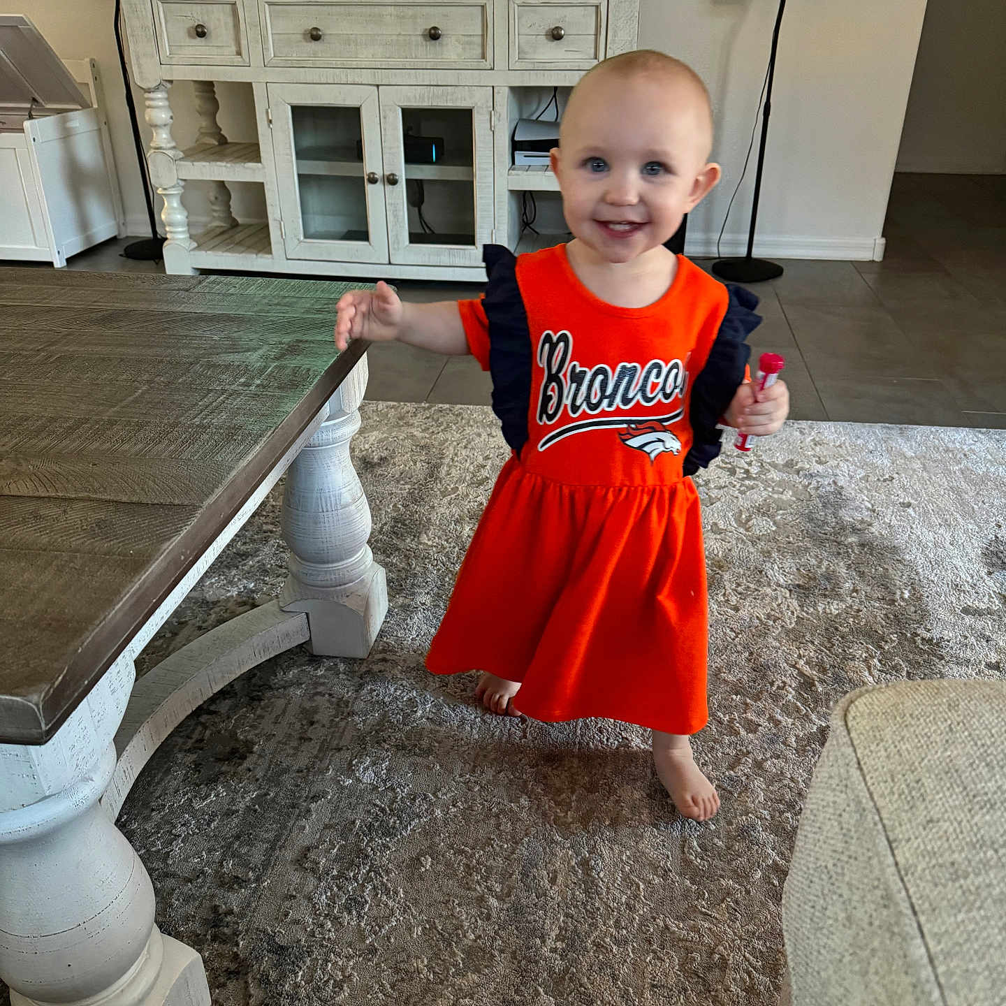 Camilla is registered to the contest to win money with this photo: architecture, building, computerhardware, couch, electronics, face, furniture, hardware, hardwood, head, indoors, livingroom, monitor, person, photography, portrait, room, screen, tv, wood