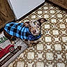 Cuda joined the competition — help win amazing prizes! dog, pet, blue_jacket, checkered_pattern, kitchen, floor, vintage_flooring, mat, christmas, indoor, curious, small_dog, brown_dog, canine, looking_up, animal, domestic_animal, footwear, wooden_cabinet, tile_floor