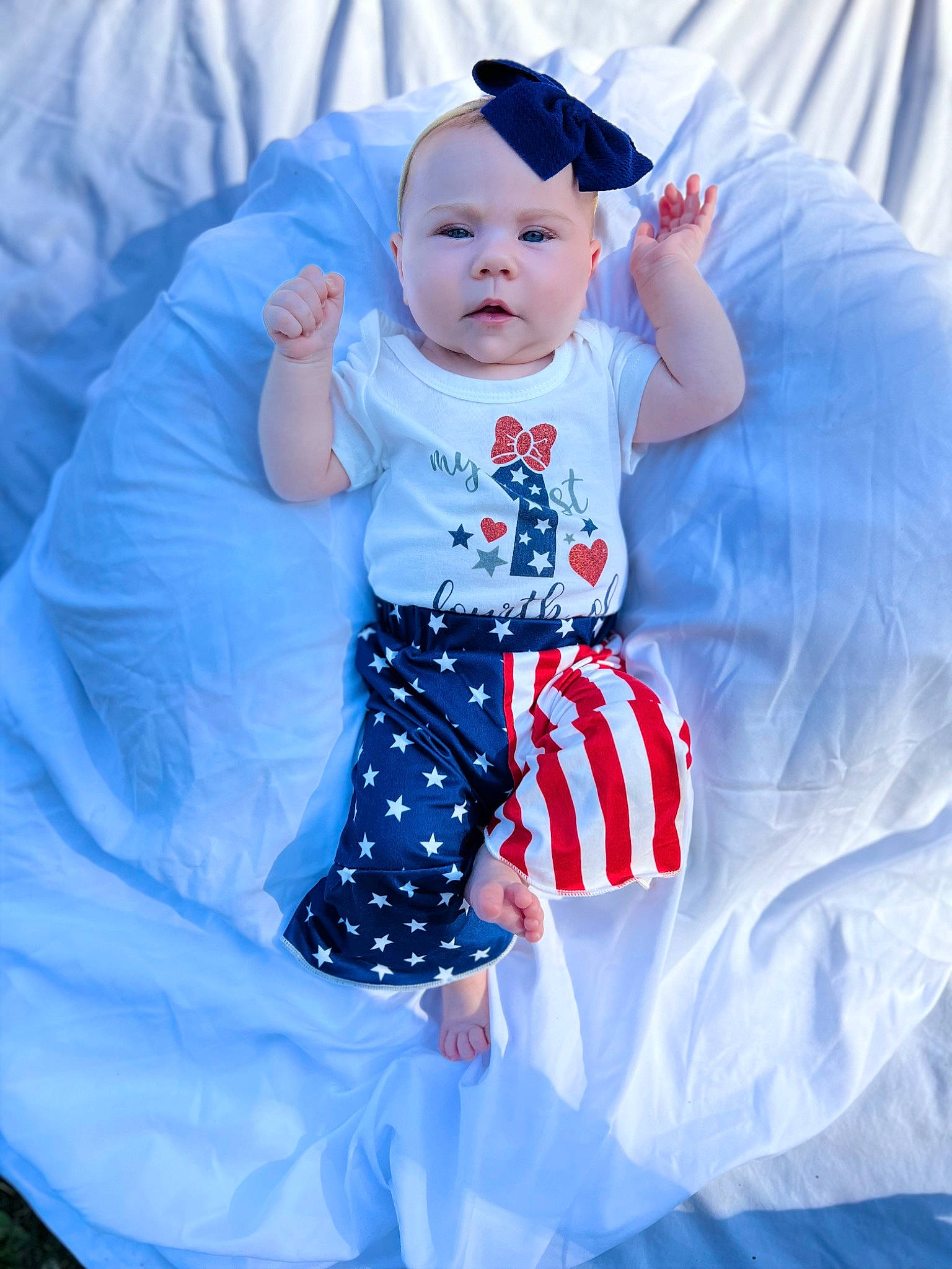 Sophia joined the competition — help win amazing prizes! aqua, azure, baby, baby_toddler_clothing, blue, child, comfort, electric_blue, fun, happy, linens, pattern, person, pink, purple, sitting, sleeve, t_shirt, textile, toddler