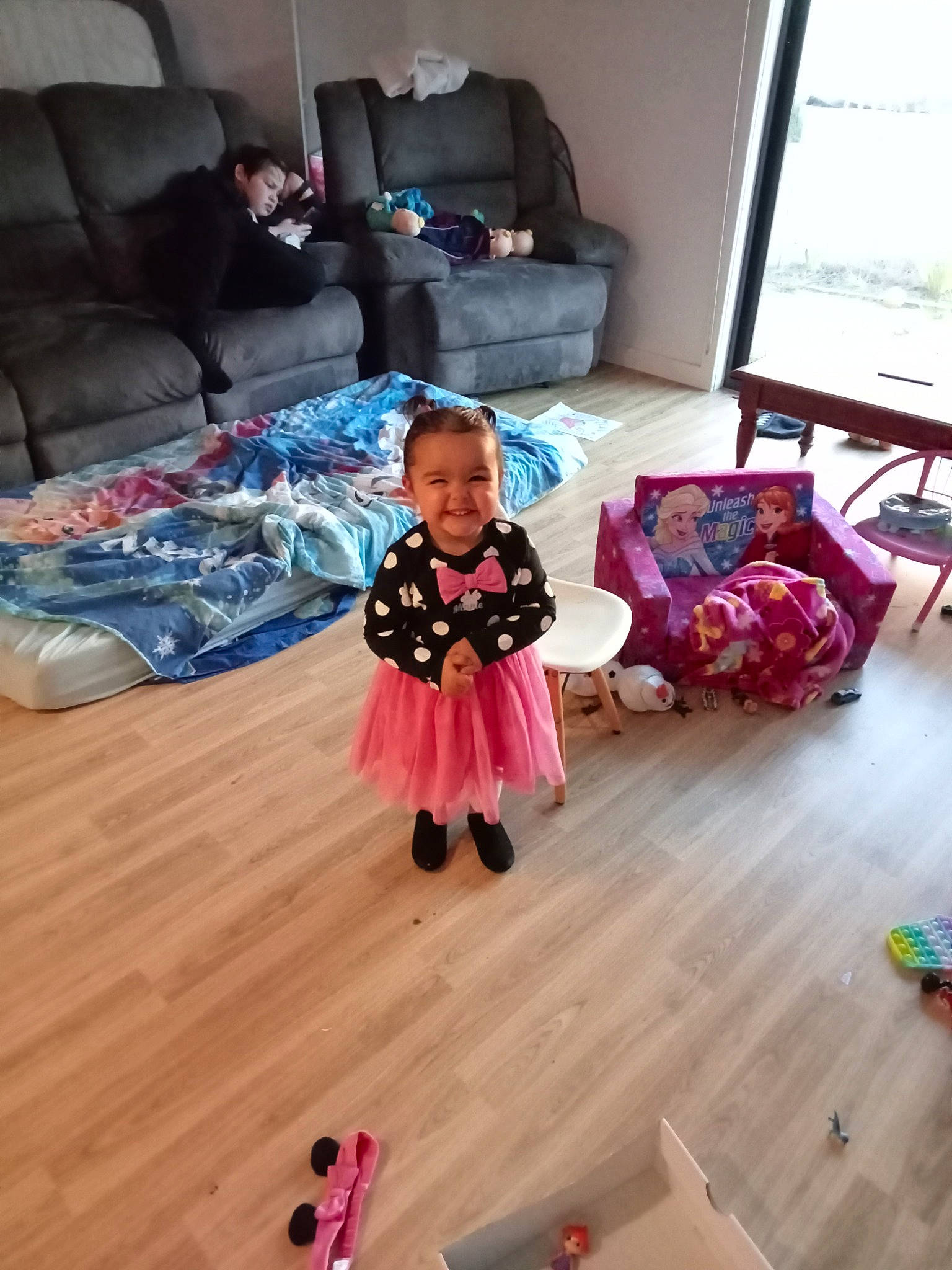Stephanie joined the competition — help win amazing prizes! baby, baby_toddler_clothing, child, comfort, couch, curtain, floor, flooring, fun, hardwood, joy, laminate_flooring, living_room, magenta, person, pink, purple, room, toddler, window