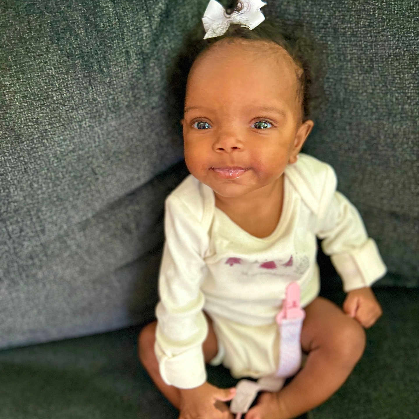 Amiri joined the competition — help win amazing prizes! accessories, baby, blonde, clothing, couch, crawling, face, furniture, hair, happy, head, jewelry, necklace, newborn, pants, person, photography, portrait, sitting, sleeve