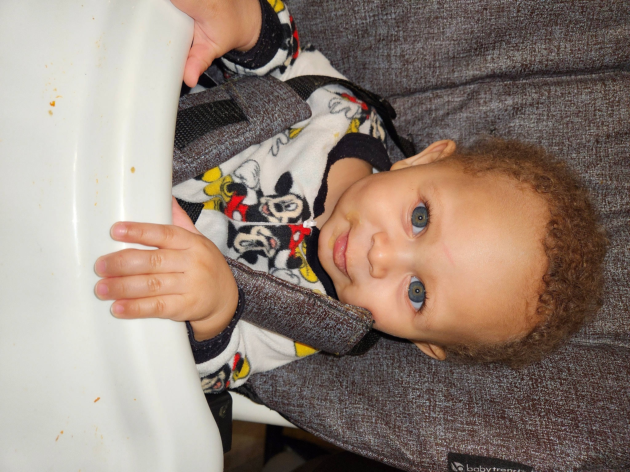 Khalil is registered to the contest to win money with this photo: baby, baby_toddler_clothing, cheek, comfort, eyelash, finger, gesture, hand, happy, iris, lip, nail, neck, nose, pattern, person, skin, sleeve, smile, thumb