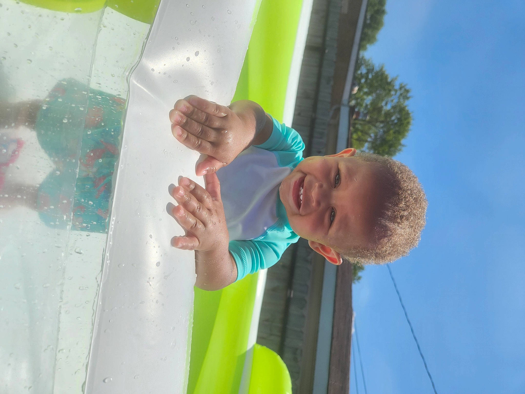 Khalil joined the competition — help win amazing prizes! ceiling, child, elbow, electric_blue, fun, gesture, glass, happy, joy, leisure, paint, pattern, person, recreation, sky, toddler, tree, vacation, visual_arts, water