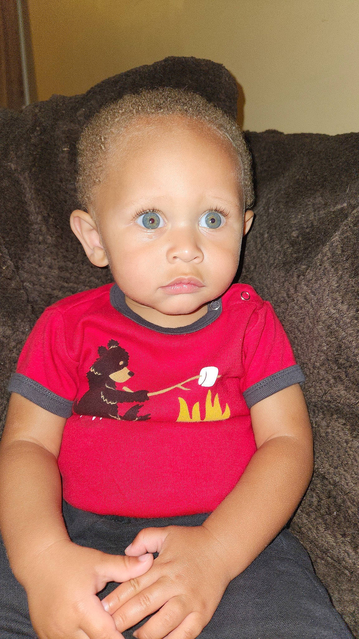 Khalil is registered to the contest to win money with this photo: baby, baby_toddler_clothing, cheek, child, chin, elbow, eye, eyelash, face, flash_photography, head, iris, lip, mammal, neck, nose, person, skin, sleeve, t_shirt