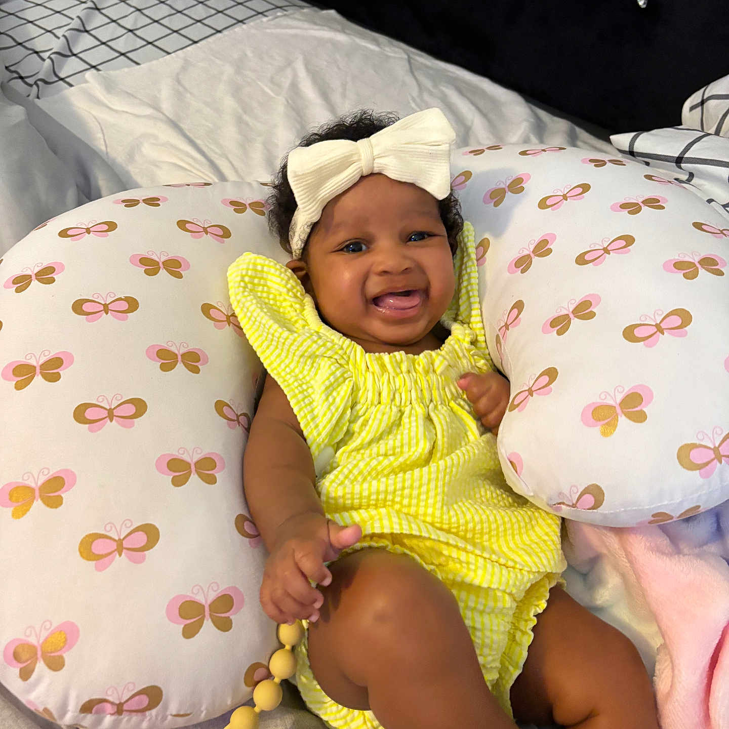 Siyah joined the competition — help win amazing prizes! baby, babylaughing, bed, blanket, bodypart, clothing, cushion, face, finger, furniture, happy, hat, head, homedecor, newborn, person, photography, pillow, portrait, smile