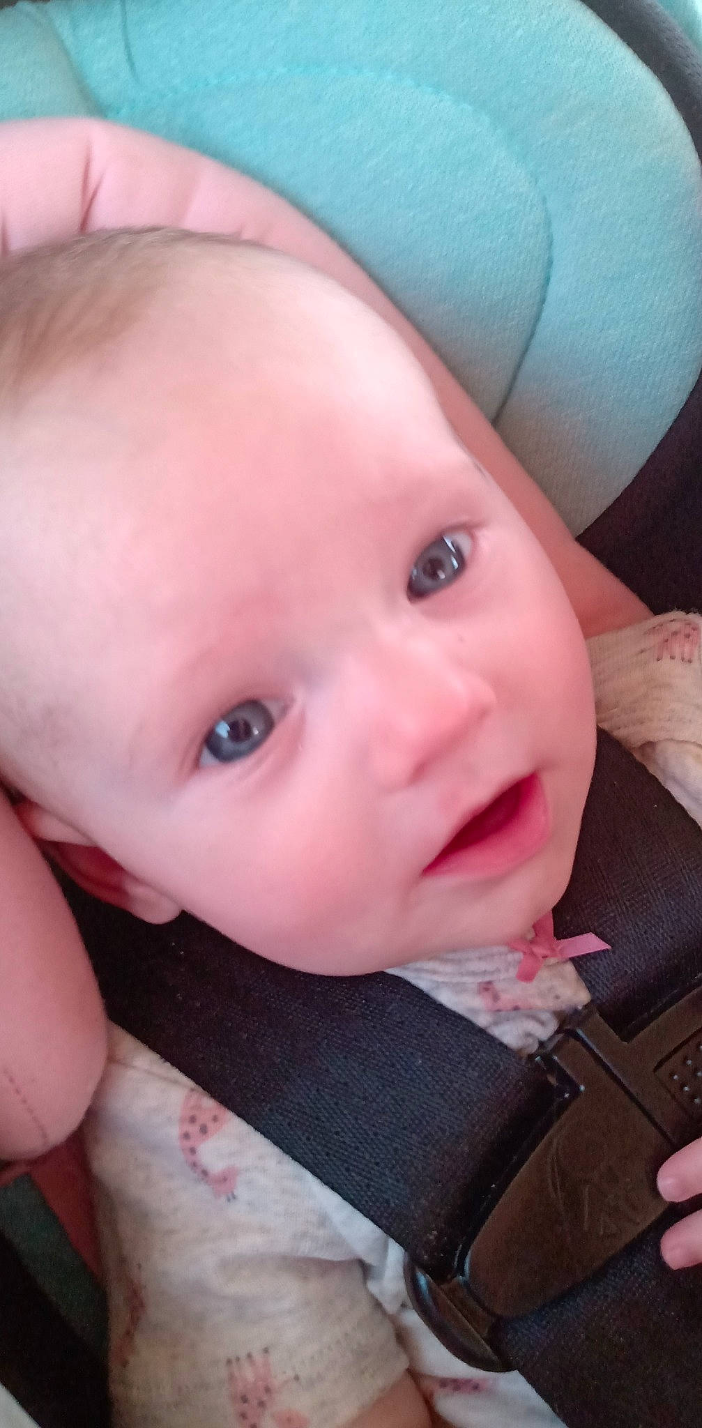 Sky is registered to the contest to win money with this photo: baby, beauty, cheek, child, chin, close_up, ear, eye, eyebrow, face, finger, forehead, head, iris, lip, mouth, nose, person, pink, skin